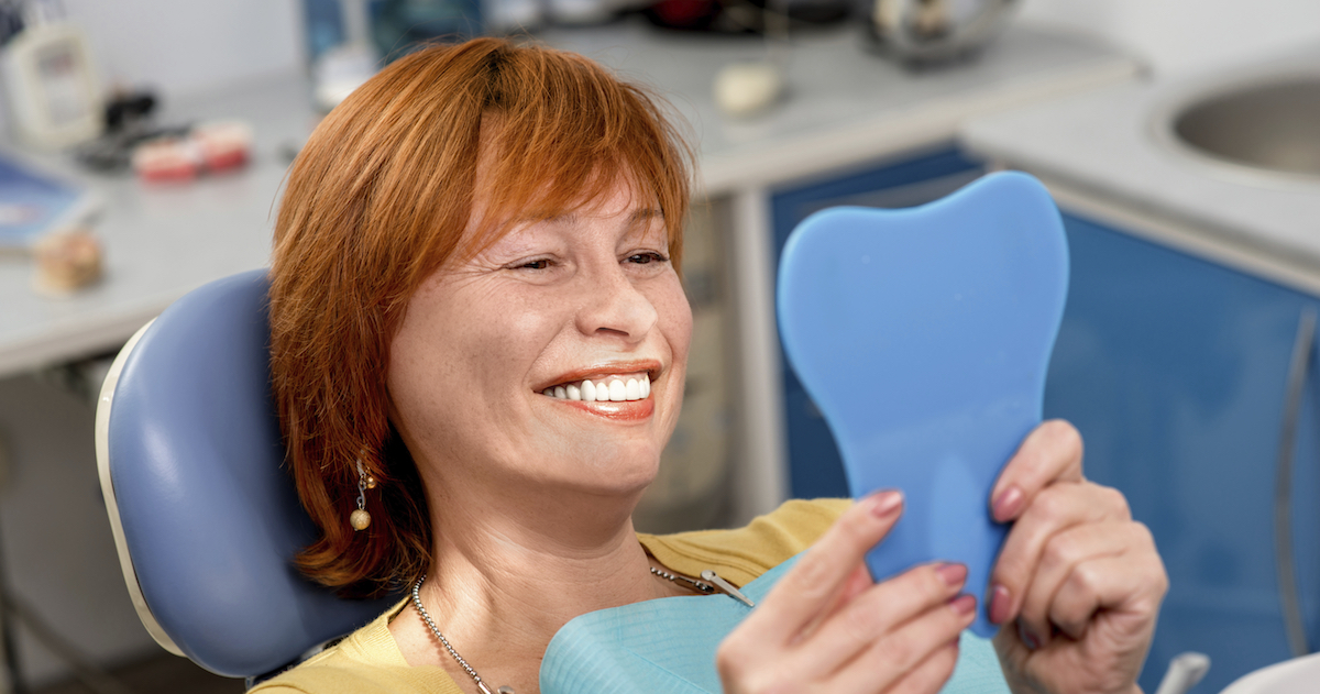 Senior woman in the dental office.